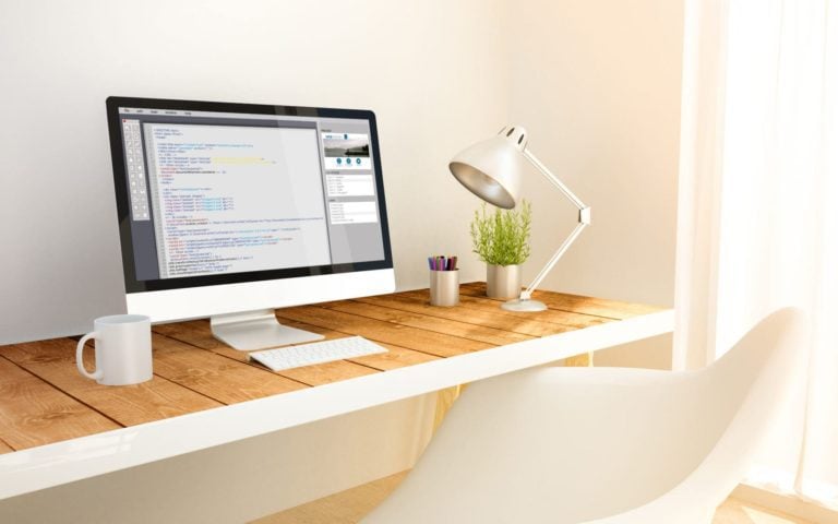 3d rendering minimalist workspace with coding computer screen computer and copyspace.  all screen graphics are made up.